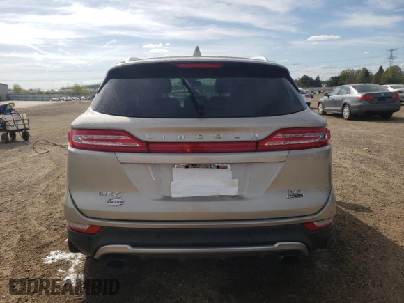 2015 Lincoln MKC z VIN 5LMCJ1A97FUJ07358, wystawiony jako Copart lot #54928855 z przebiegiem 85 844 mil mil oraz Szkody całkowita. Historia ofert i sprzedaży dostępna na DreamBid. Obrazek 6.