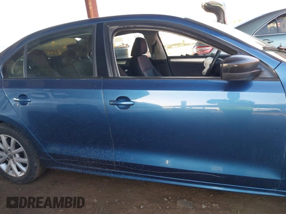 2015 Volkswagen Jetta SE z VIN 3VWD17AJ2FM291120, wystawiony jako IAAI lot #41763085 z przebiegiem 139 272 mil mil oraz . Historia ofert i sprzedaży dostępna na DreamBid. Obrazek 13.