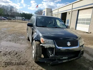 2012 Suzuki Grand Vitara Premium z VIN JS3TD0D66C4100814, wystawiony jako Copart lot #89250025 z przebiegiem 102 381 mil mil oraz Szkody całkowita. Historia ofert i sprzedaży dostępna na DreamBid. Obrazek 12.