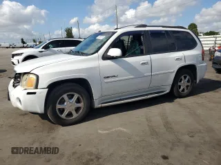 2005 GMC Envoy Denali z VIN 1GKES63MX52321416, wystawiony jako Copart lot #57587575 z przebiegiem 252 571 mil mil oraz Szkody całkowita. Historia ofert i sprzedaży dostępna na DreamBid. Obrazek 1.