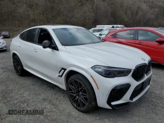 2022 BMW X6 M with VIN 5YMCY0C09N9J70336, listed as a Copart auction lot 52682365 with 0 mi miles and Salvage Title. Bid and sale history available at carsss.com. Image 4.