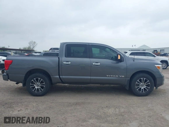 2020 Nissan Titan Platinum Reserve with VIN 1N6AA1EF1LN503027, listed as a IAAI auction lot 41937860 with 88,250 mi miles and . Bid and sale history available at DreamBid. Image 13.