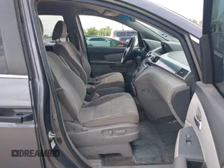 2016 Honda Odyssey LX with VIN 5FNRL5H27GB003250, listed as a IAAI auction lot 42103335 with 151,516 mi miles and . Bid and sale history available at DreamBid. Image 5.