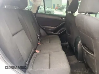 2016 Mazda CX-5 Sport с VIN JM3KE4BY3G0779206, выставлен на аукционе Copart как лот 58854805 с пробегом 144 434 миль миль и Чистый • Clean title. История ставок и продаж доступна на DreamBid. Изображение 10.