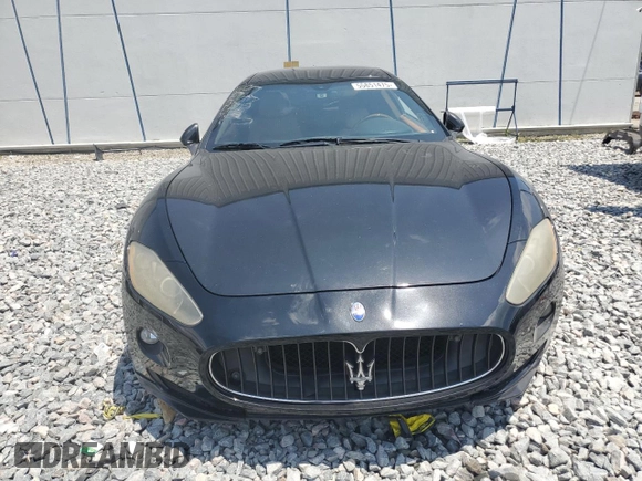2011 Maserati GranTurismo S with VIN ZAM45KLA9B0059436, listed as a Copart auction lot 55851475 with Not provided miles and Clean title. Bid and sale history available at DreamBid. Image 5.