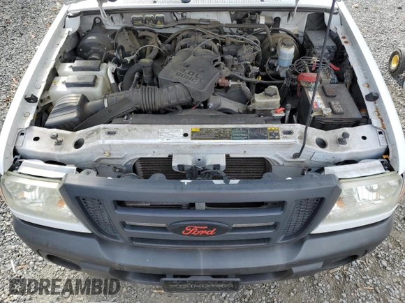 2010 Ford Ranger with VIN 1FTLR1EE1APA37032, listed as a Copart auction lot 82587614 with 215,440 mi miles and Salvage Title. Bid and sale history available at DreamBid. Image 11.