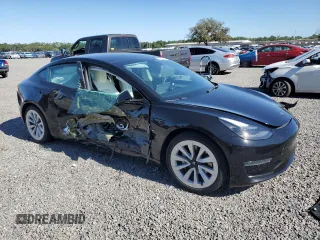 2022 Tesla Model 3 with VIN 5YJ3E1EA5NF102554, listed as a Copart auction lot 53195075 with 62,453 mi miles and Salvage Title. Bid and sale history available at DreamBid. Image 4.