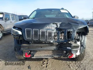 2020 Jeep Cherokee Trailhawk z VIN 1C4PJMBX5LD532516, wystawiony jako IAAI lot #41730502 z przebiegiem 85 543 mil mil oraz . Historia ofert i sprzedaży dostępna na DreamBid. Obrazek 12.