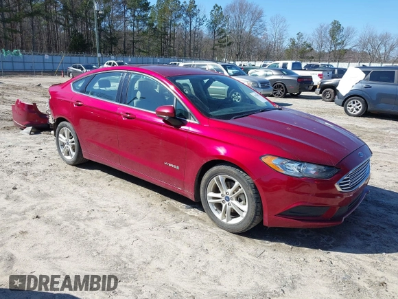 2018 Ford Fusion Hybrid SE with VIN 3FA6P0LU1JR243022, listed as a IAAI auction lot 41470052 with 119,636 mi miles. Bid and sale history available at carsss.com. Image 1.