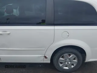 2012 Dodge Grand Caravan SE with VIN 2C4RDGBG8CR115003, listed as a IAAI auction lot 42217153 with 196,833 mi miles and . Bid and sale history available at DreamBid. Image 13.