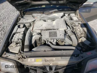 1990 Mercedes-Benz 500 z VIN WDBFA66E8LF010613, wystawiony jako Copart lot #47093275 z przebiegiem 120 814 mil mil oraz Szkody całkowita. Historia ofert i sprzedaży dostępna na DreamBid. Obrazek 11.