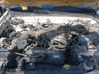 2000 Toyota Tacoma with VIN 5TEWN72N1YZ690947, listed as a IAAI auction lot 41951521 with 207,119 mi miles and . Bid and sale history available at DreamBid. Image 10.