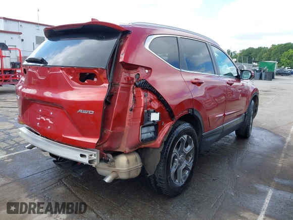 2018 Honda CR-V EX-L z VIN 2HKRW2H83JH651686, wystawiony jako IAAI lot #42356284 z przebiegiem 60 550 mil mil oraz . Historia ofert i sprzedaży dostępna na DreamBid. Obrazek 4.