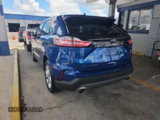 2021 Ford Edge Titanium with VIN 2FMPK3K98MBA53776, listed as a IAAI auction lot 42785493 with 114,856 mi miles and . Bid and sale history available at DreamBid. Image 6.