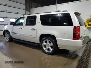 2012 Chevrolet Suburban LTZ with VIN 1GNSKKE74CR325522, listed as a Copart auction lot 52215745 with 214,973 mi miles and Clean Title. Bid and sale history available at carsss.com. Image 2.