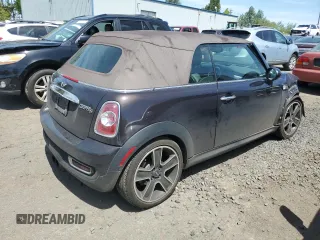 2013 MINI Convertible S with VIN WMWZP3C51DT551373, listed as a Copart auction lot 57878745 with 110,181 mi miles and Salvage title. Bid and sale history available at DreamBid. Image 3.