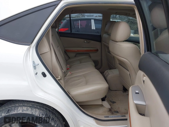 2007 Lexus RX 400h with VIN JTJGW31U572004833, listed as a IAAI auction lot 41938575 with 221,084 mi miles and . Bid and sale history available at DreamBid. Image 8.