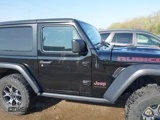 2018 Jeep Wrangler Rubicon z VIN 1C4HJXCG9JW193703, wystawiony jako IAAI lot #42065185 z przebiegiem 61 518 mil mil oraz . Historia ofert i sprzedaży dostępna na DreamBid. Obrazek 13.