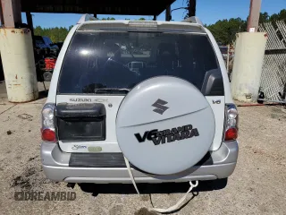 2004 Suzuki Grand Vitara z VIN JS3TE62V544100024, wystawiony jako Copart lot #75613324 z przebiegiem Nie podano mil oraz Czysty tytuł • Clean title. Historia ofert i sprzedaży dostępna na DreamBid. Obrazek 6.