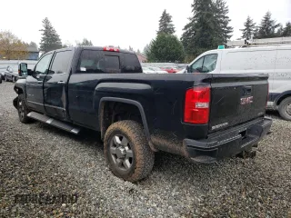2016 GMC Sierra 3500HD Denali z VIN 1GT42YE82GF140938, wystawiony jako Copart lot #52556095 z przebiegiem 136 654 mil mil oraz Szkoda całkowita • Salvage title. Historia ofert i sprzedaży dostępna na DreamBid. Obrazek 2.