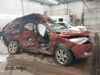 2016 Ford Escape Titanium with VIN 1FMCU9JXXGUA53238, listed as a IAAI auction lot 38472772 with Not Provided miles and . Bid and sale history available at DreamBid. Image 12.