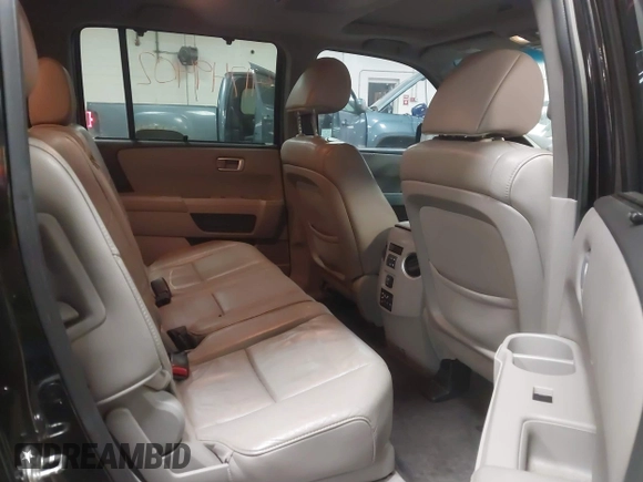 2012 Honda Pilot Touring with VIN 5FNYF4H91CB067014, listed as a IAAI auction lot 41749402 with 151,248 mi miles. Bid and sale history available at carsss.com. Image 8.