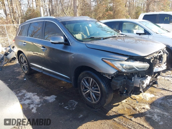 2016 Infiniti QX60 with VIN 5N1AL0MM7GC503196, listed as a IAAI auction lot 41313283 with 152,516 mi miles and . Bid and sale history available at DreamBid. Image 1.