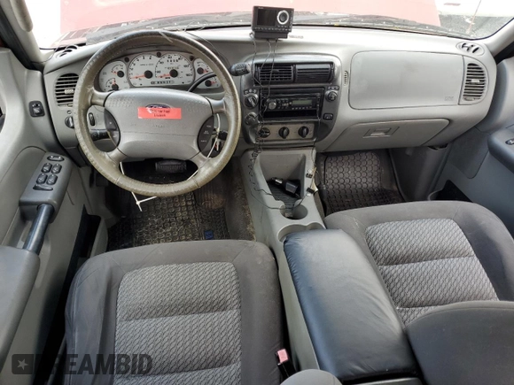 2003 Ford Explorer Sport Trac XLS с VIN 1FMZU77E13UA65499, выставлен на аукционе Copart как лот 55819835 с пробегом 296 172 миль миль и Чистый • Clean title. История ставок и продаж доступна на DreamBid. Изображение 8.