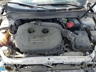 2013 Lincoln MKZ z VIN 3LN6L2G98DR804632, wystawiony jako Copart lot #56985055 z przebiegiem 128 509 mil mil oraz Szkoda całkowita • Salvage title. Historia ofert i sprzedaży dostępna na DreamBid. Obrazek 11.