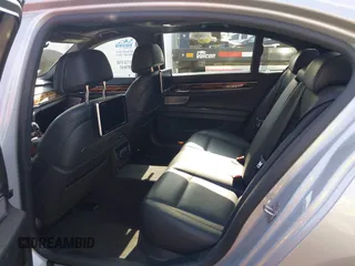 2015 BMW 7 Series 750Li with VIN WBAYE8C5XFD782039, listed as a IAAI auction lot 41505626 with 74,716 mi miles. Bid and sale history available at carsss.com. Image 8.