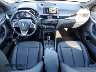 2021 BMW X1 xDrive28i with VIN WBXJG9C04M5T78933, listed as a Copart auction lot 45018135 with 72,067 mi miles and Salvage Title. Bid and sale history available at carsss.com. Image 8.