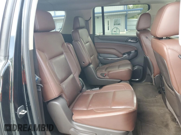 2015 Chevrolet Suburban LTZ with VIN 1GNSKKKC4FR119803, listed as a Copart auction lot 51416775 with 135,366 mi miles and Salvage Title. Bid and sale history available at DreamBid. Image 11.