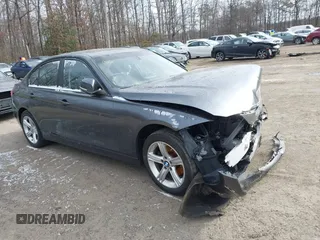 2013 BMW 3 Series 328i xDrive with VIN WBA3B3C51DF530218, listed as a IAAI auction lot 41605206 with 154,993 mi miles and . Bid and sale history available at carsss.com. Image 1.