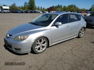 2009 Mazda 3 S Touring with VIN JM1BK344X91230315, listed as a Copart auction lot 52615435 with 262,436 mi miles and Salvage title. Bid and sale history available at DreamBid. Image 1.