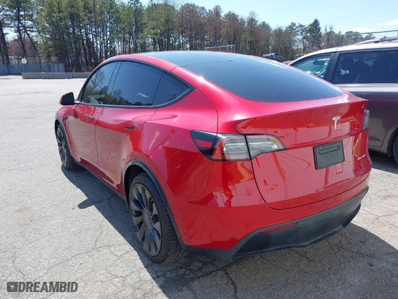 2023 Tesla Model Y Long Range with VIN 7SAYGDEE0PA094810, listed as a IAAI auction lot 41998312 with 10,376 mi miles. Bid and sale history available at carsss.com. Image 3.