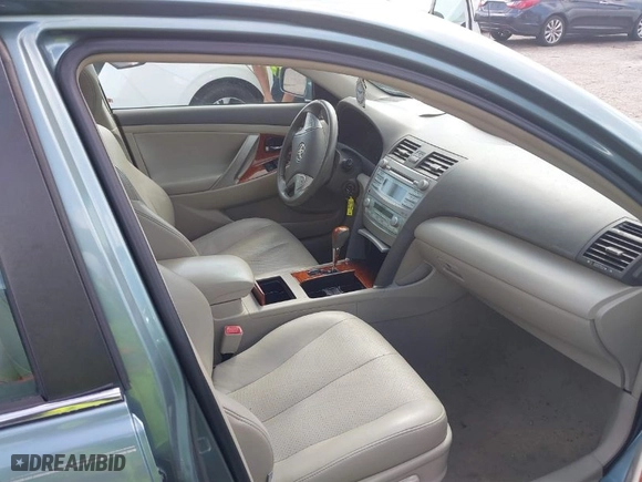 2009 Toyota Camry with VIN 4T1BE46KX9U887960, listed as a IAAI auction lot 41727053 with 130,300 mi miles. Bid and sale history available at carsss.com. Image 5.