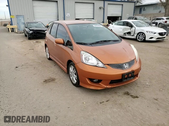 2009 Honda Fit Sport z VIN JHMGE88429S025410, wystawiony jako Copart lot #84963934 z przebiegiem 122 807 mil mil oraz Szkoda całkowita • Salvage title. Historia ofert i sprzedaży dostępna na DreamBid. Obrazek 11.