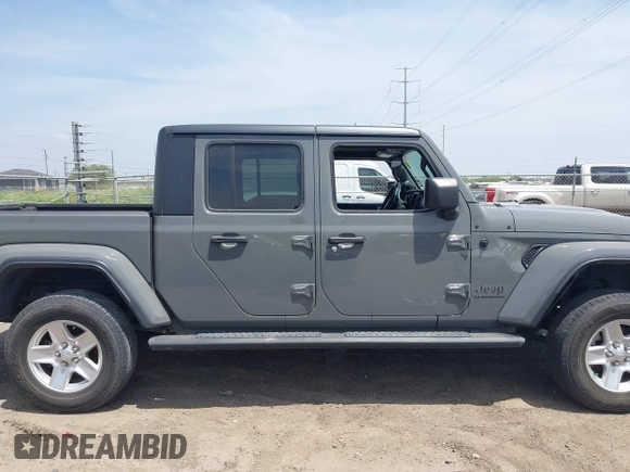 2021 Jeep Gladiator Sport S z VIN 1C6JJTAG9ML538769, wystawiony jako IAAI lot #42078142 z przebiegiem 49 924 mil mil oraz . Historia ofert i sprzedaży dostępna na DreamBid. Obrazek 13.
