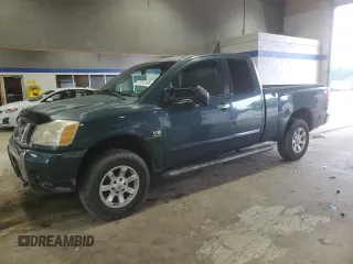 2004 Nissan Titan SE with VIN 1N6AA06B84N566360, listed as a Copart auction lot 57933105 with 133,066 mi miles and Salvage title. Bid and sale history available at DreamBid. Image 1.