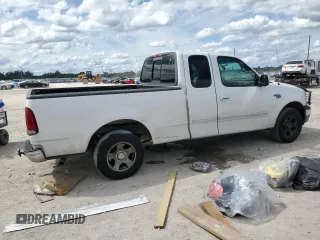 2000 Ford F-150 XL with VIN 1FTRX17L4YNA81687, listed as a Copart auction lot 46996675 with 0 mi miles and Salvage Title. Bid and sale history available at carsss.com. Image 3.