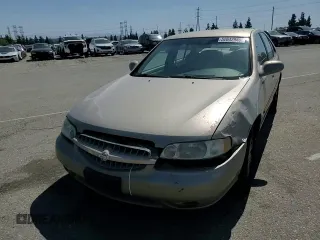 2000 Nissan Altima XE z VIN 1N4DL01D5YC243801, wystawiony jako Copart lot #52642985 z przebiegiem 237 665 mil mil oraz Szkoda całkowita • Salvage title. Historia ofert i sprzedaży dostępna na DreamBid. Obrazek 11.