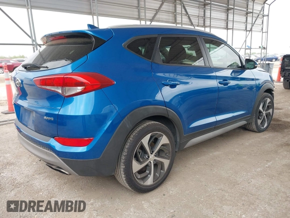 2018 Hyundai Tucson Sport with VIN KM8J33AL0JU803368, listed as a IAAI auction lot 41937235 with 64,163 mi miles and . Bid and sale history available at DreamBid. Image 4.