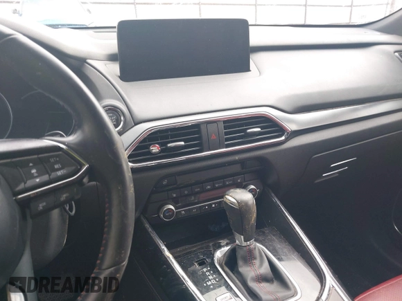 2021 Mazda CX-9 Grand Touring with VIN JM3TCADY2M0509286, listed as a IAAI auction lot 39976279 with 93,588 mi miles and . Bid and sale history available at DreamBid. Image 15.
