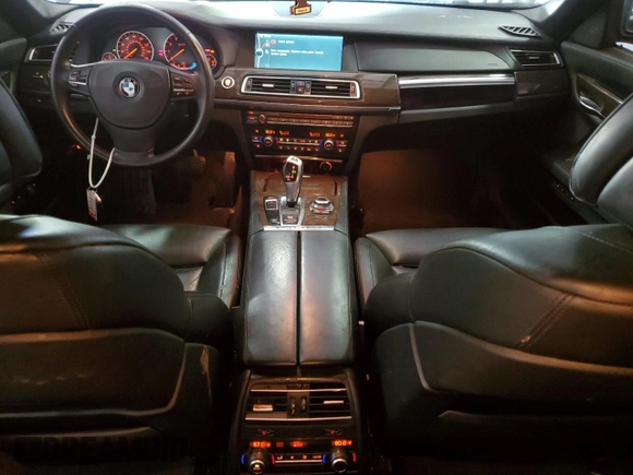 2011 BMW 7 Series with VIN WBAKX6C50BC197118, listed as a Copart auction lot 73686234 with 166,393 mi miles and Clean title. Bid and sale history available at DreamBid. Image 8.