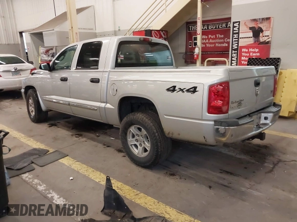 2005 Dodge Dakota Laramie with VIN 1D7HW58N75S188127, listed as a IAAI auction lot 41209206 with 117,480 mi miles and . Bid and sale history available at DreamBid. Image 3.