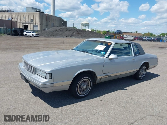 1987 Chevrolet Monte Carlo z VIN 1G1GZ11Z4HR114011, wystawiony jako IAAI lot #42204871 z przebiegiem 74 357 mil mil oraz . Historia ofert i sprzedaży dostępna na DreamBid. Obrazek 2.