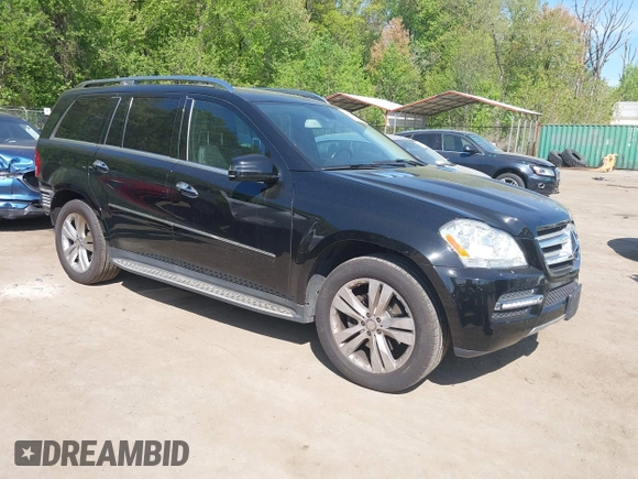 2012 Mercedes-Benz GL-Class GL 450 with VIN 4JGBF7BEXCA790393, listed as a IAAI auction lot 42082681 with 143,095 mi miles. Bid and sale history available at carsss.com. Image 1.
