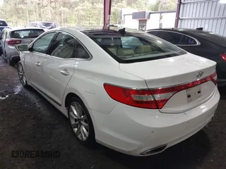 2014 Hyundai Azera Limited with VIN KMHFH4JG7EA378755, listed as a IAAI auction lot 42027136 with 216,082 mi miles and . Bid and sale history available at carsss.com. Image 3.