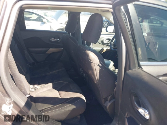 2017 Jeep Cherokee Latitude with VIN 1C4PJLCBXHW572714, listed as a IAAI auction lot 41861087 with 120,552 mi miles and . Bid and sale history available at DreamBid. Image 8.