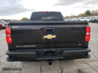 2018 Chevrolet Silverado 1500 LT with VIN 1GCVKREH7JZ217819, listed as a Copart auction lot 77070104 with 130,709 mi miles and Salvage Title. Bid and sale history available at carsss.com. Image 6.